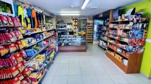 a store aisle of a grocery store at ALBERGUE CASA MARIELA solo peregrinos con credenciales in Torres del Río