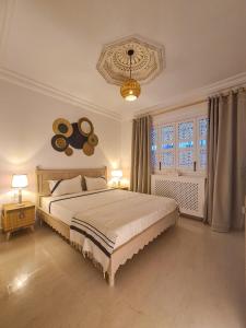 Letto o letti in una camera di Dar Colibri - Maison d'hôtes à Kélibia
