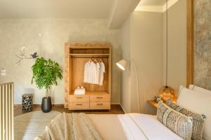 Postel nebo postele na pokoji v ubytování Casbah Boutique Hotel