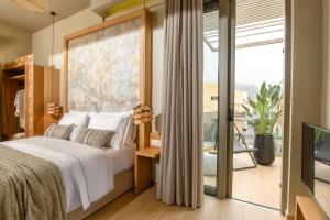 Postel nebo postele na pokoji v ubytování Casbah Boutique Hotel