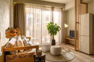 TV a/nebo společenská místnost v ubytování Casbah Boutique Hotel