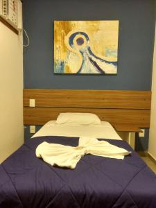 Postel nebo postele na pokoji v ubytování Itacuruçá Inn