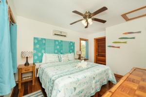 Postel nebo postele na pokoji v ubytování Bella Vista Resort Belize