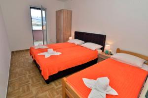 Cama ou camas em um quarto em Apartmani Gogić