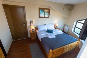 Postel nebo postele na pokoji v ubytování Motel Atos