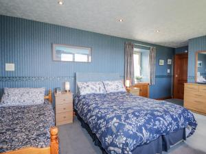 Postel nebo postele na pokoji v ubytování Braehead Croft