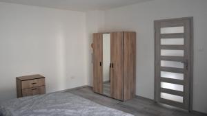 A bed or beds in a room at Apartmán u Braňa