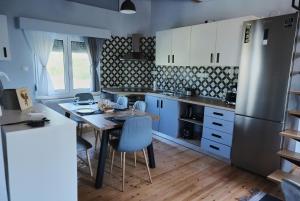 Kuchyň nebo kuchyňský kout v ubytování Pegasus' Glory House + 70 fotografií