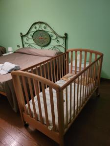 Ένα ή περισσότερα κρεβάτια σε δωμάτιο στο Pisicchio Rooms