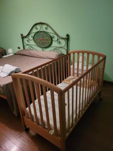 Posteľ alebo postele v izbe v ubytovaní Pisicchio Rooms