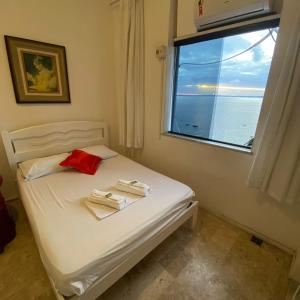 Uma cama ou camas num quarto em Hotel Pousada Brisa Mar