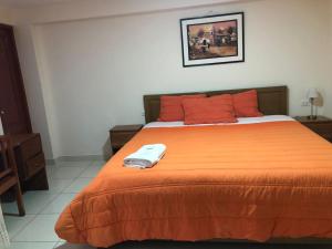 Rúm í herbergi á Tambo Cusco Inn
