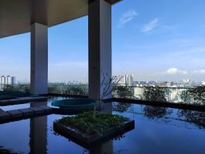 Photo de la galerie de l'établissement Executive 2-Bedroom Next to Paradigm Mall and New World Hotel, à Petaling Jaya
