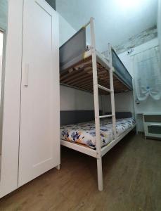 Posteľ alebo postele v izbe v ubytovaní La Perla di Marzamemi
