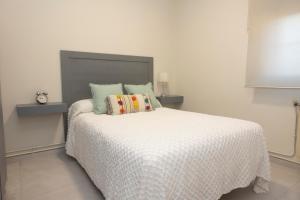 A bed or beds in a room at Casa Rivas