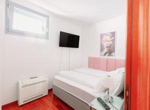 Posteľ alebo postele v izbe v ubytovaní Apartmant Split Centar Soleo