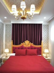 Postel nebo postele na pokoji v ubytování Free Style Hotel Dalat
