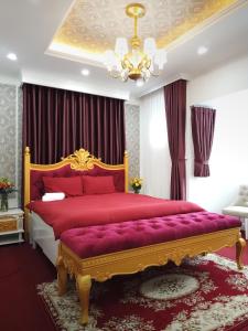 Postel nebo postele na pokoji v ubytování Free Style Hotel Dalat