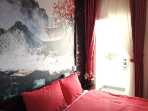 Postel nebo postele na pokoji v ubytování Free Style Hotel Dalat