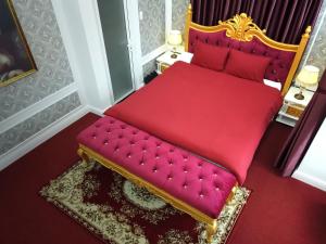 Postel nebo postele na pokoji v ubytování Free Style Hotel Dalat