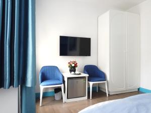 TV a/nebo společenská místnost v ubytování Free Style Hotel Dalat