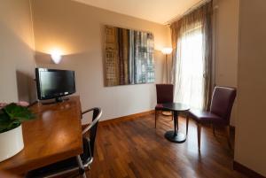 TV o dispositivi per l'intrattenimento presso HOTEL QUERINI Business Hotel Sandrigo