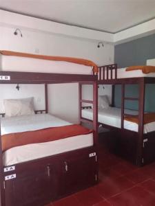 Postel nebo postele na pokoji v ubytování Pecatu GuestHouse