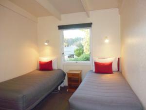 Postel nebo postele na pokoji v ubytování Spa Lodge Motel
