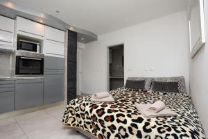 Postel nebo postele na pokoji v ubytování Apartments Viky