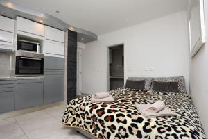 Кровать или кровати в номере Apartments Viky