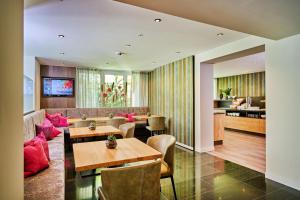 TV a/nebo společenská místnost v ubytování City Appartementhotel