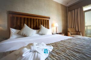 Voodi või voodid majutusasutuse Atana Khasab Hotel toas