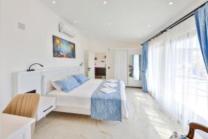 A bed or beds in a room at Villa Summery
