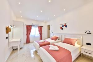 A bed or beds in a room at Villa Summery