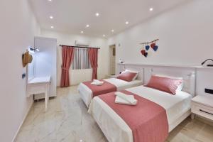 A bed or beds in a room at Villa Summery