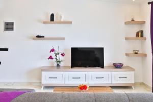 A television and/or entertainment centre at Villa Summery