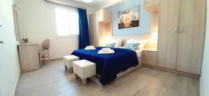 Posteľ alebo postele v izbe v ubytovaní The Central Residence - Kassiopi Corfu Villas