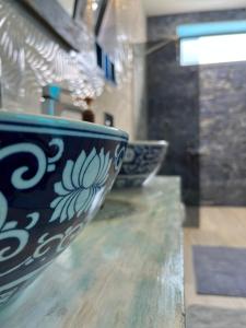 two blue and white bowls sitting on a counter at HemDem Alçıtepe in Canakkale
