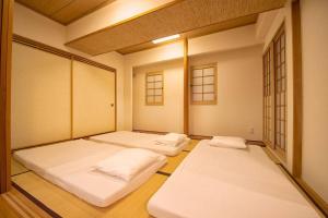 Легло или легла в стая в MolinHotels602 アクティビティを満喫できる札幌定山渓 天然温泉付- 1L2Room S-Bed8 8Persons