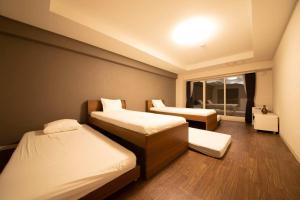 Легло или легла в стая в MolinHotels602 アクティビティを満喫できる札幌定山渓 天然温泉付- 1L2Room S-Bed8 8Persons