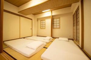 Легло или легла в стая в MolinHotels602 アクティビティを満喫できる札幌定山渓 天然温泉付- 1L2Room S-Bed8 8Persons