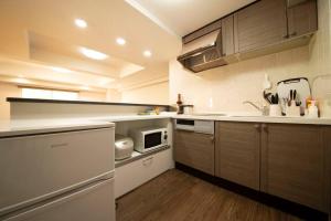Кухня или кухненски бокс в MolinHotels602 アクティビティを満喫できる札幌定山渓 天然温泉付- 1L2Room S-Bed8 8Persons