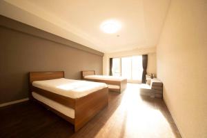Легло или легла в стая в MolinHotels602 アクティビティを満喫できる札幌定山渓 天然温泉付- 1L2Room S-Bed8 8Persons