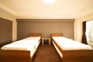 Легло или легла в стая в MolinHotels602 アクティビティを満喫できる札幌定山渓 天然温泉付- 1L2Room S-Bed8 8Persons