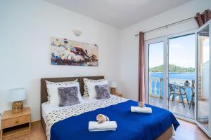 Postel nebo postele na pokoji v ubytování Family apartment