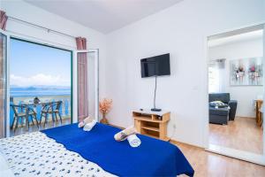 Postel nebo postele na pokoji v ubytování Family apartment