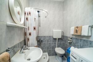 Koupelna v ubytování Family apartment
