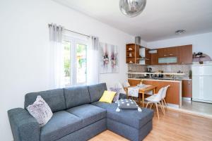 Kuchyň nebo kuchyňský kout v ubytování Family apartment