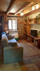 Μια τηλεόραση ή/και κέντρο ψυχαγωγίας στο Casa La Cabiana +37 φωτογραφίες
