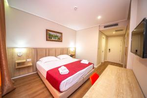 CLASS Hotel 객실 침대